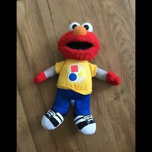 Talking Elmo toy doll